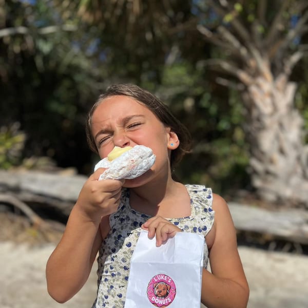 Kid enjoying a donut