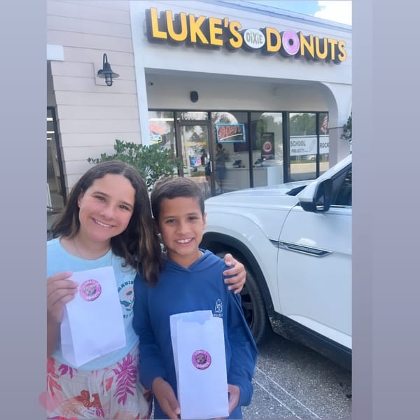 Kid enjoying a donut