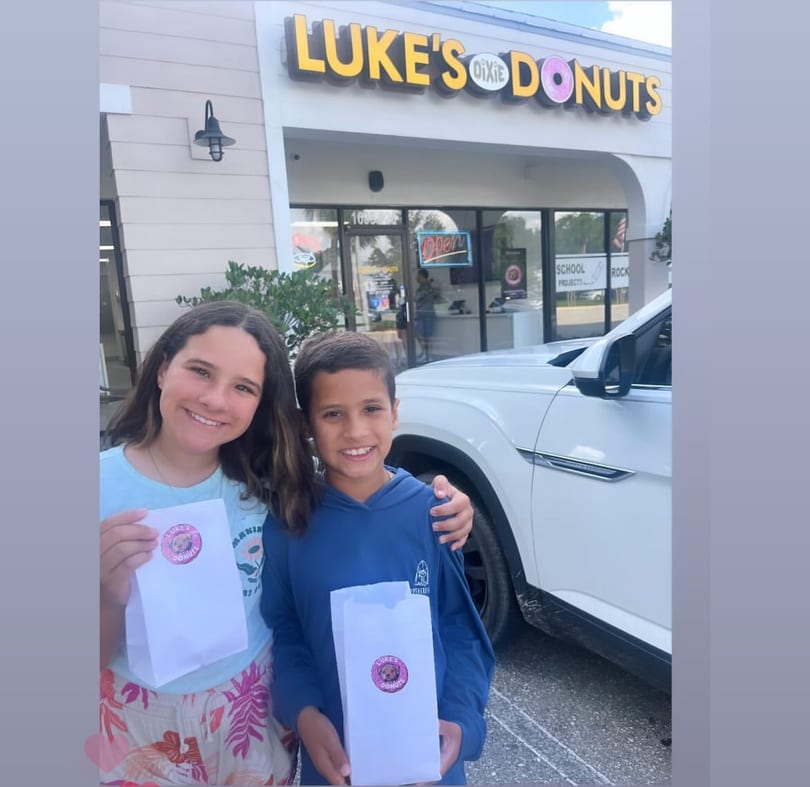 Kid enjoying a donut