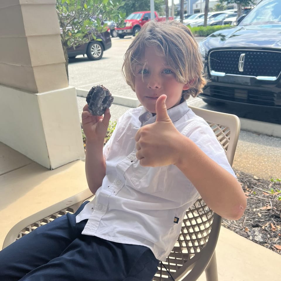 Kid enjoying a donut